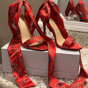 RED AND GOLD TIE UP HEELS